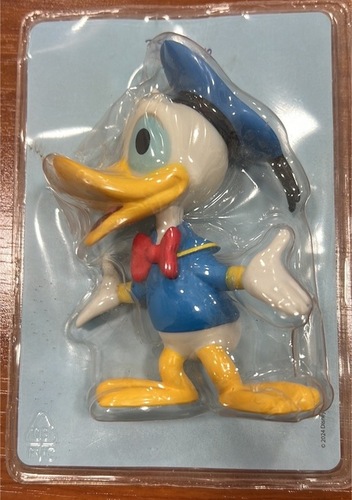 Figura di Paperino Disney, ancora sigillata nel blister originale
