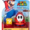 World of Nintendo - Super Mario Bros, statuetta articolata, 10,2 cm, figure Red Shy Guy con blocco domanda